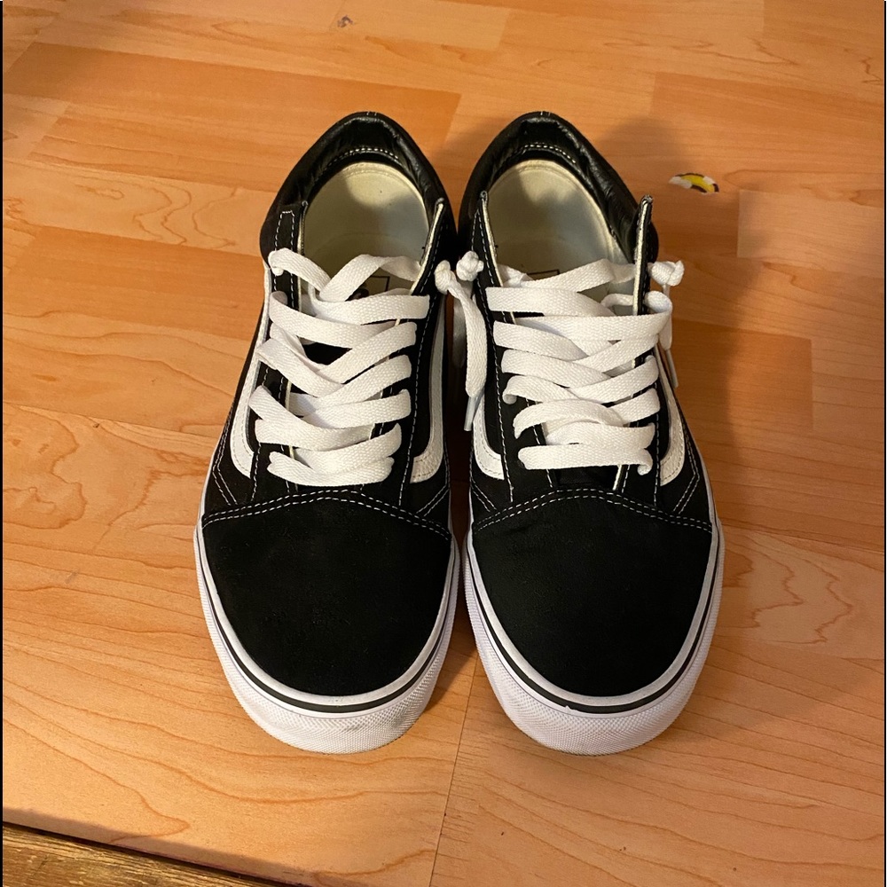 Black Vans.